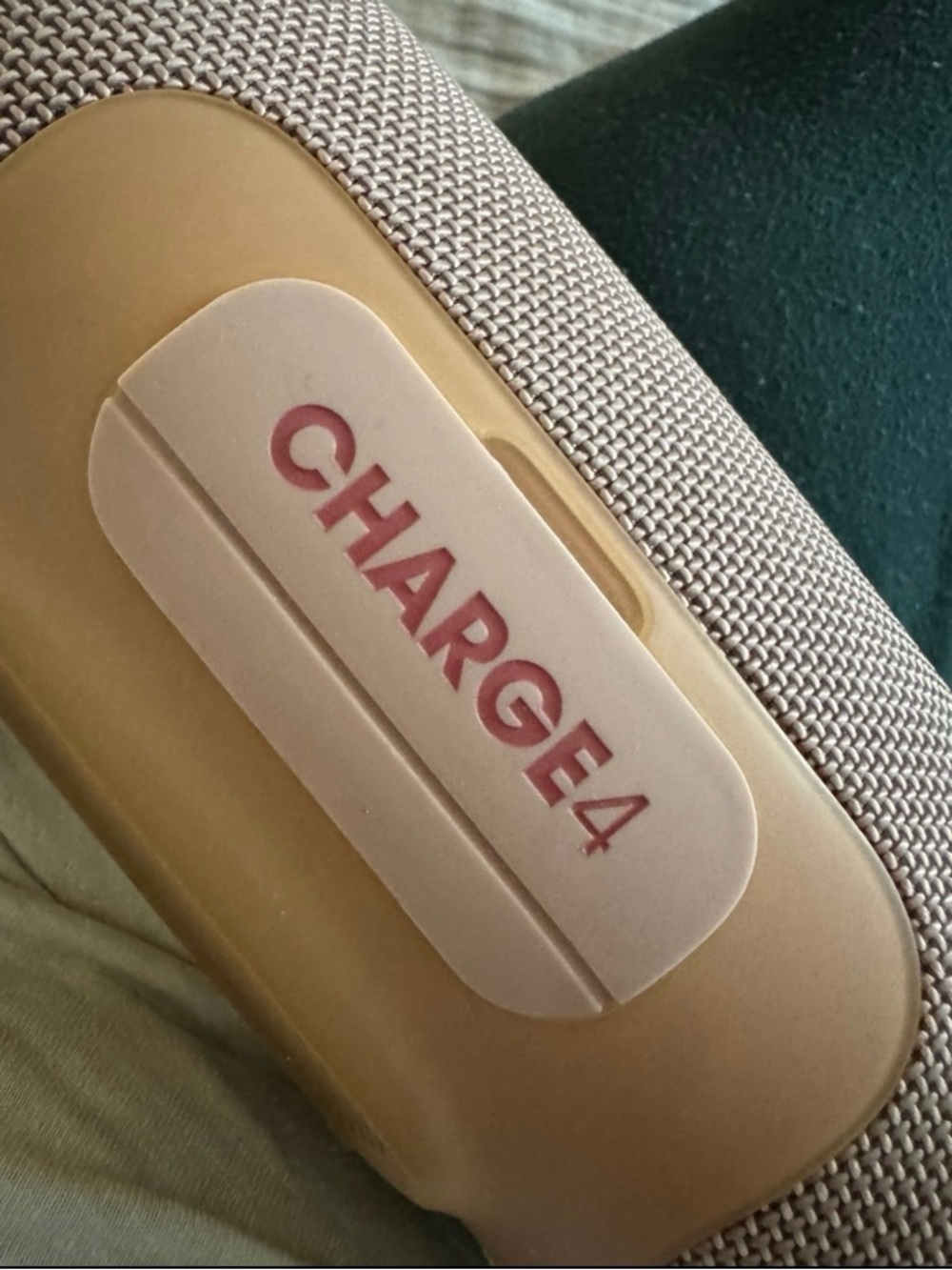 JBL Charge4 Portable Bluetooth Speaker in Light Pink and Beige